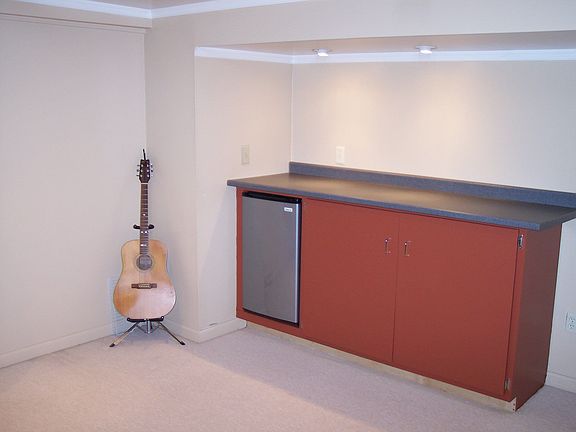 Bar w/ fridge in basement