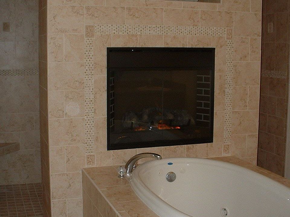 Master Bathroom w/ walkthru shower & fireplace & jacuzzi tub