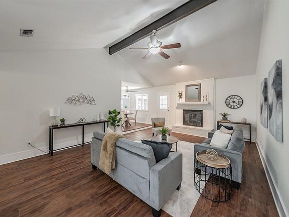 Living room view from entrance with fireplace