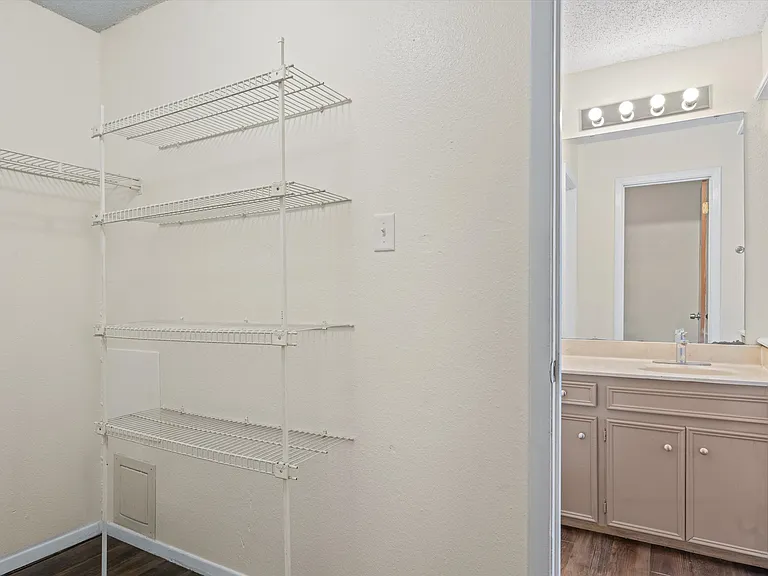 Walk-in closet in master bedroom
