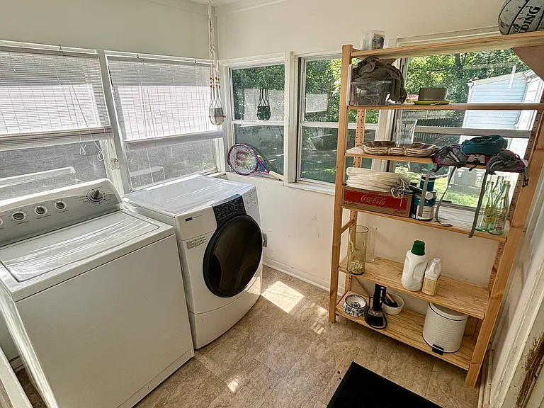 Laundry room/ backroom to porch. Great for storage ( I keep my bike here).