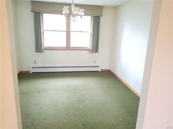 Formal Dining Room with Chandelier to entertain Family and Friends