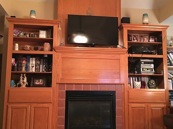 Builtin shelves w/ fireplace