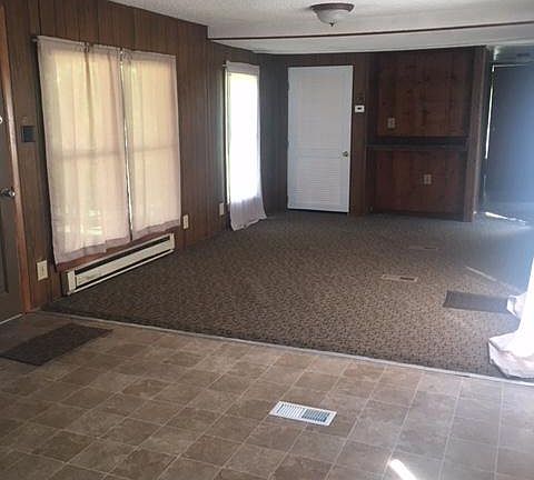 Living room with coat closet