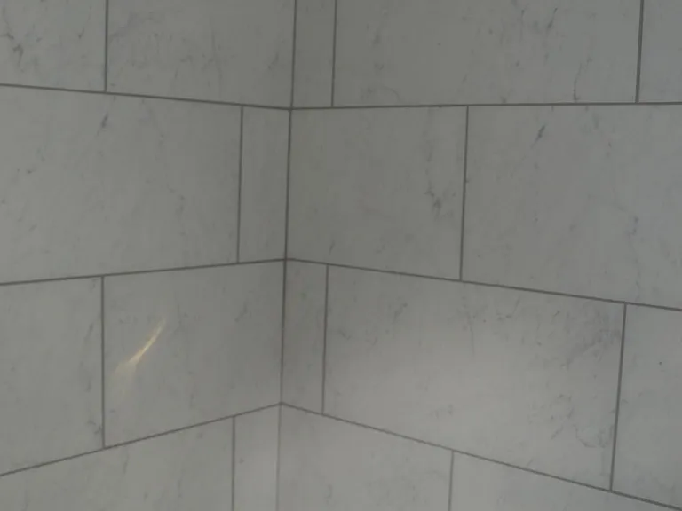 tub/shower is fully tiled.