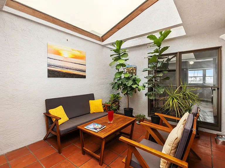 Enclosed patio with lots of natural light