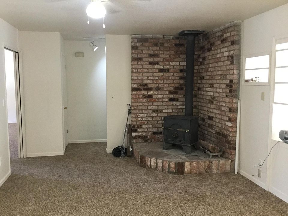 Wood burning fireplace adds warmth and charm