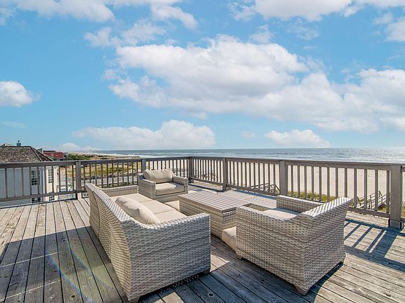 Third floor ocean front lounging area. The views are spectacular here. The ocean, waves and stars at night. You can also see the bay. One word- outstanding.