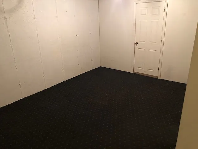 Convenient mudroom entry from the garage featuring a spacious storage closet which is perfect for everyday organization.
