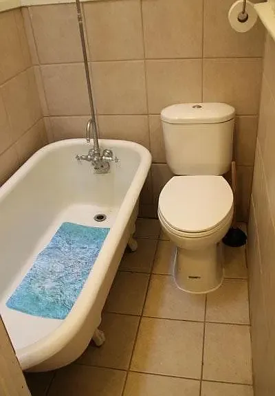 Claw foot tub with shower surround