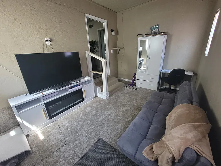 bedroom number 4 being used as a office /game room