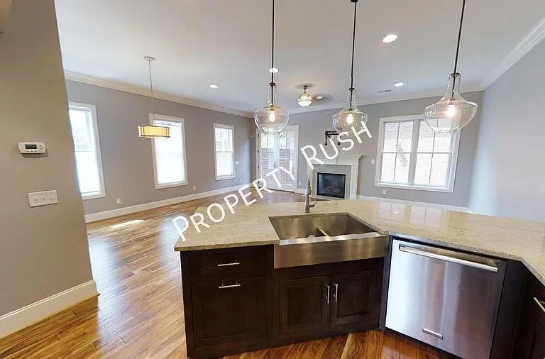 105 E 3rd St — Photo 13
