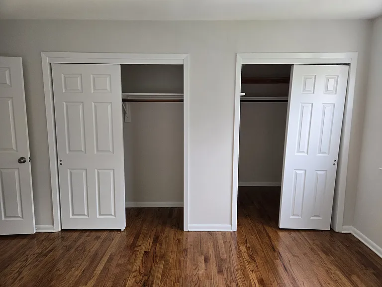 Double closets of primary bedroom.
