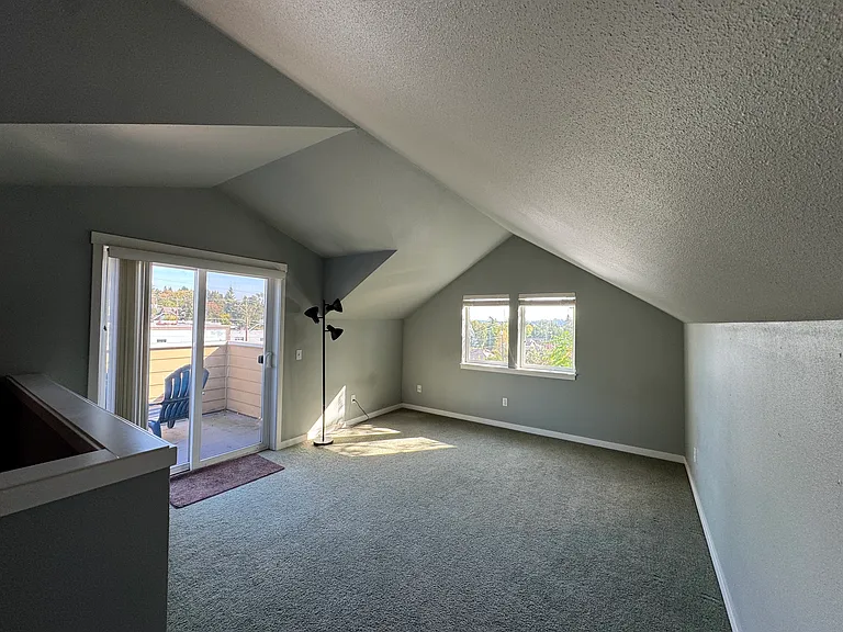 Loft/flex room with vaulted ceiling on the top floor, private balcony, views of Mt. Rainier & Territorial views plus multiple storage spaces