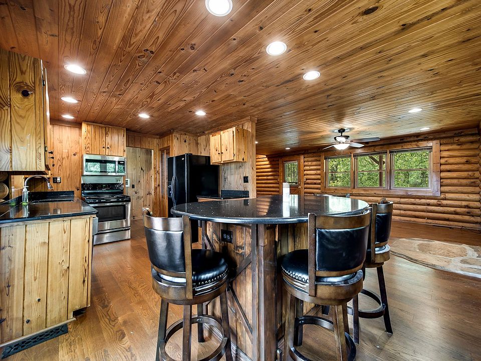 Welcome home. Love this kitchen layout! This island area is a great addition for extra seating.