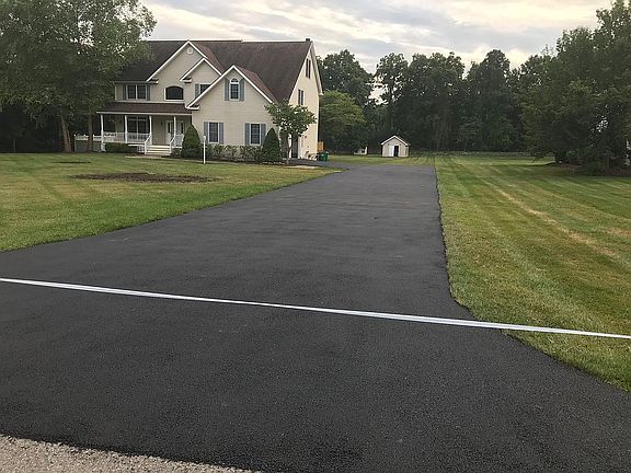 Double wide & flat driveway.