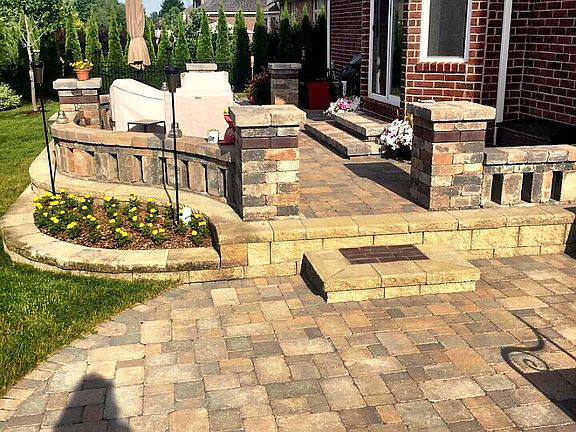Raised Unilock paver patio