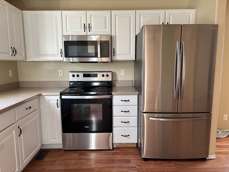 All new appliances in kitchen: fridge, range, microwave, dishwasher, faucet, and disposal (and LED lights)