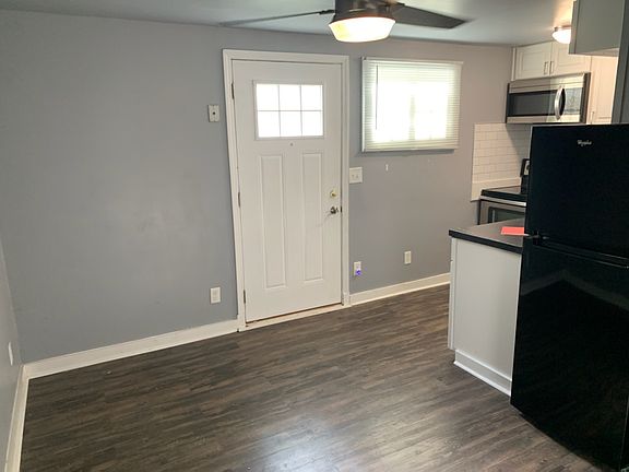 glimpse of living area looking toward kitchen