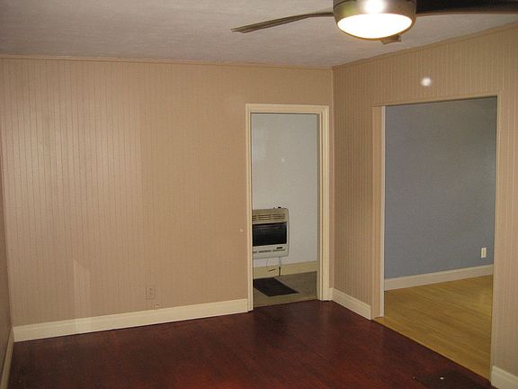 Hardwood living & dining rooms.  Carpet in bedrooms.  Propane & electric heat.