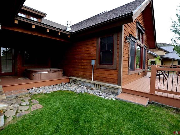 Hot tub alcove and back deck over looking golf course.