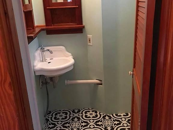 Charming Bathroom new tiles, refurbished corner sink