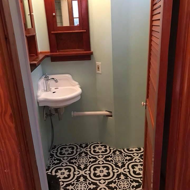 Charming Bathroom new tiles, refurbished corner sink