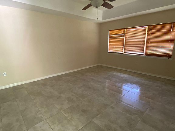 Large open open concept living room off of the kitchen.