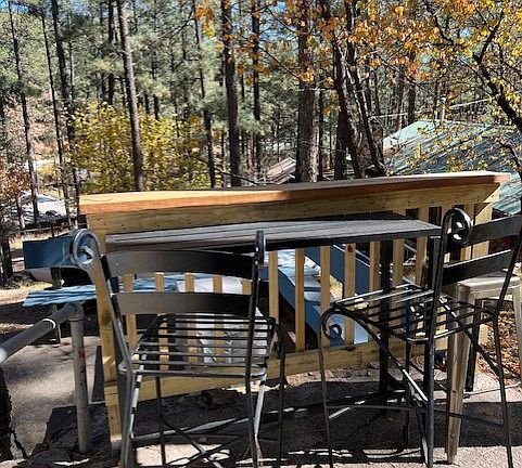 Table and chairs on front porch
