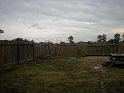 The backyard backs to the neighborhood retention pond and play ground plus a double rear gate.