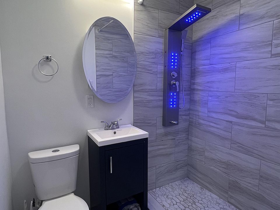 upstairs unit bathroom - standing shower