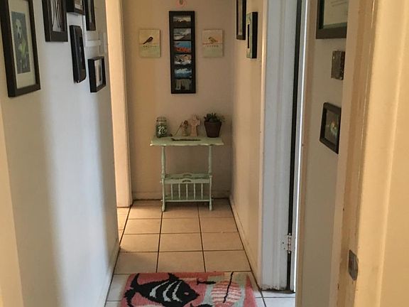 hallway to bedroom and bathroom