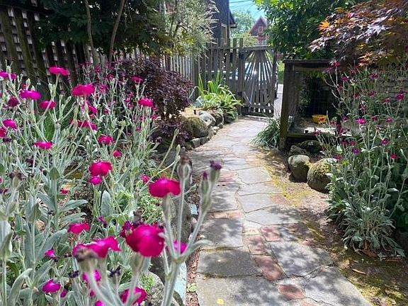 Front walkway with gate to driveway