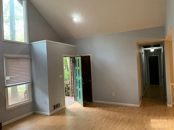 Living room with vaulted ceilings