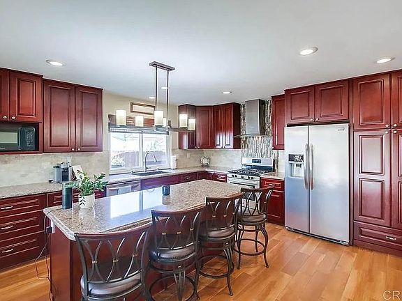 5th image of 9129 Dewsbury Ave
