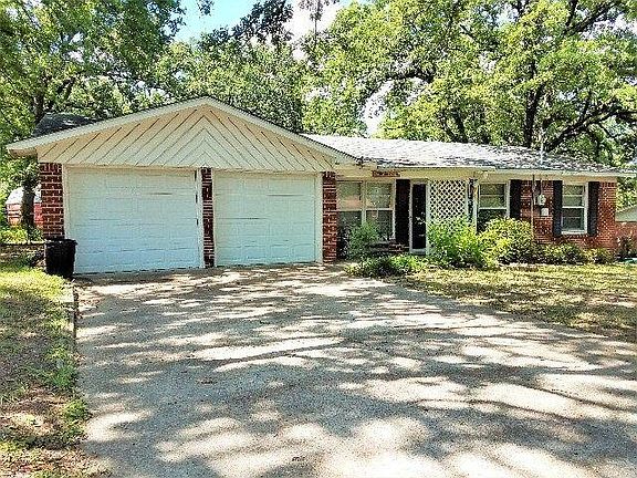 Front drive and garage.