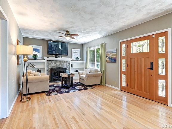 Enter through a new door surrounded by beautiful leaded glass windows.
