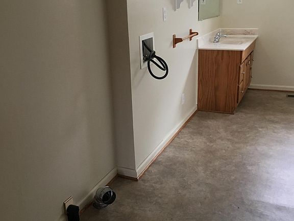 Bathroom with laundry hookups