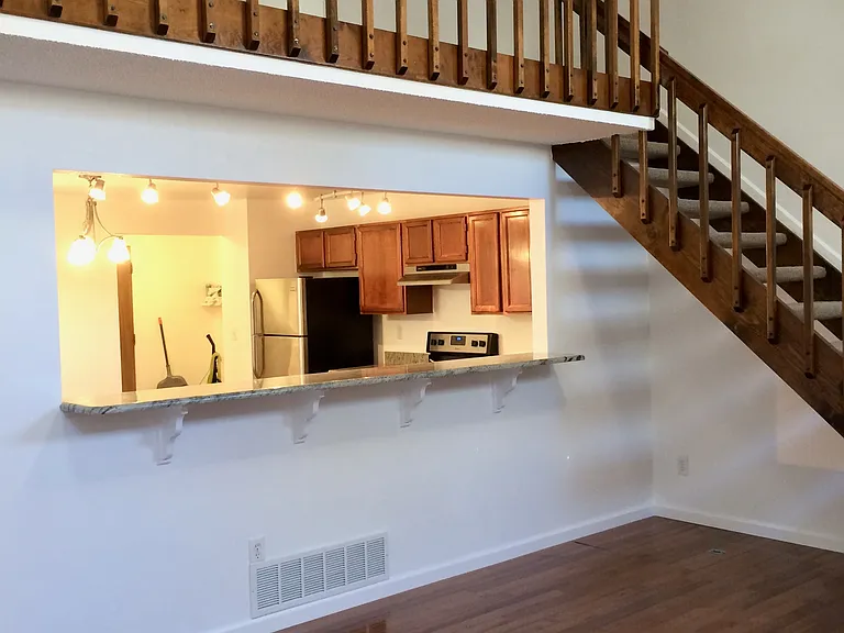 Kitchen and staircase to upstairs