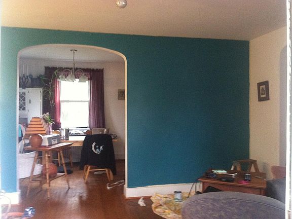 Wall is no longer this color being painted in this pic! View from front door; doorway into dining room