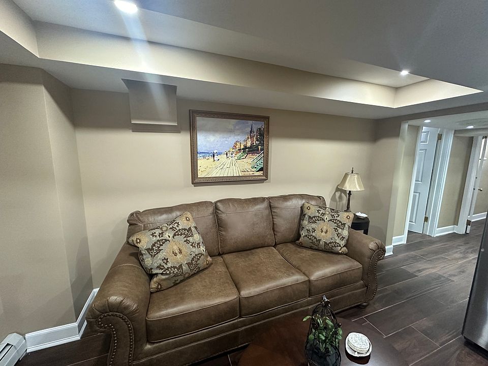 Queen pullout mattress located in the kitchen/living room and coffee table.