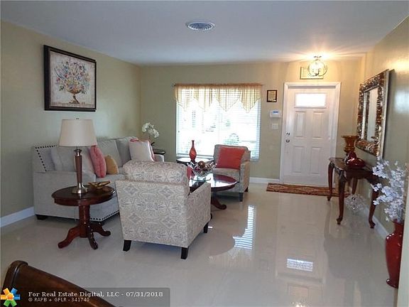 Living Room/entryway. Decorator tile throughout.
