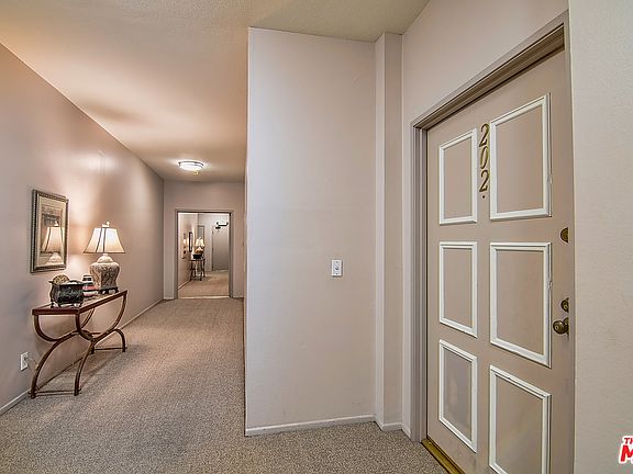 2nd image of 5650 Woodman Ave Unit 202