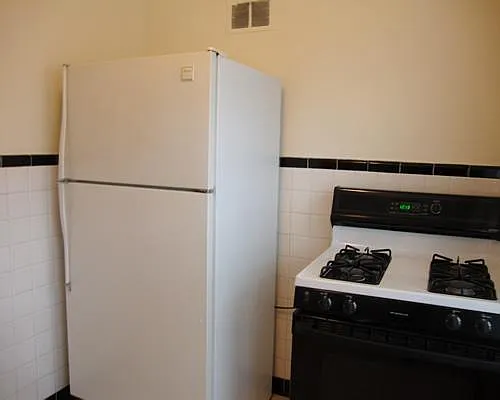 Building Photo - 5936 Loughborough Ave #1E