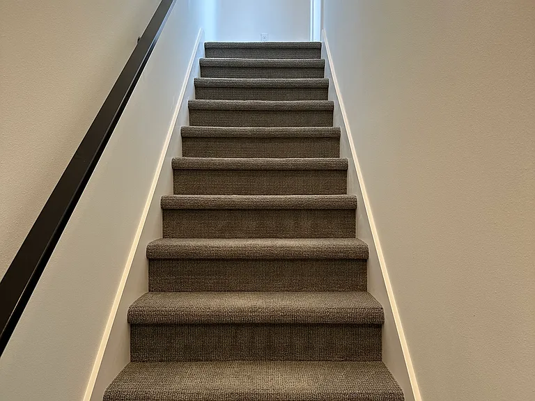 Stairwell from second bedroom to roof deck.