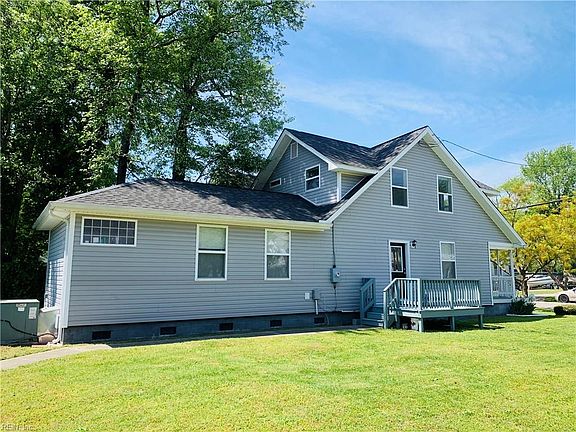 Spacious Owner's suite downstairs is the back half of the house!