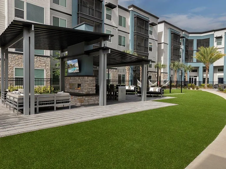 The Addison Universal Blvd Outdoor Fireplace and Seating