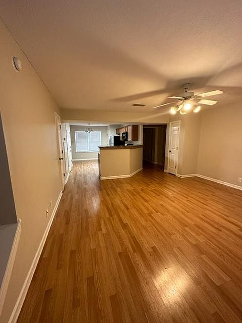 Living room, looking into kitchen
