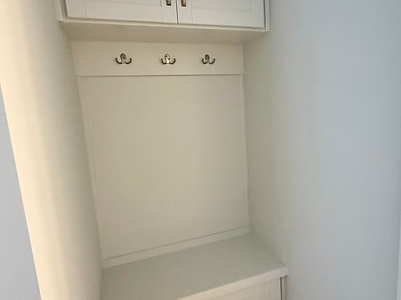 Mudroom with coat rack and bench with Shoe Storage