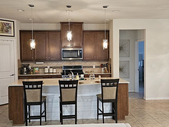 Kitchen with extended Island and built in custom cabinets